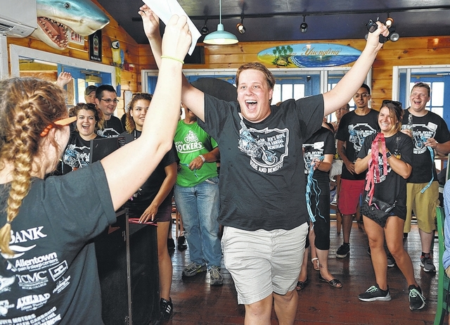Jimmy Musto, of Jenkins Township, is thrilled to have his name picked in one of the many raffles at the Fourth Annual Dr. Jen’s Hope Motorcycle Rally and Block Party at Cooper’s Seafood House and Cabana in Pittston.